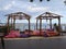 Protaras. Famagusta region. Cyprus. Cafe next to the beach, no people. Tents with soft, low mattresses, scattered multi-colored