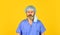 Protect people from virus. Beginning of virus outbreak. Man bearded doctor uniform yellow background. Type of virus