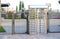 Protected entrance gate.Entrance to office through big in full human growth stainless steel turnstiles. Concept of security, lock