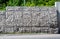 Protection fence or wall made of gabions with stones