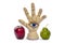 Protective amulet in the shape of an open palm and eye made of felted wool with apple and pear