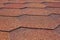 Protective covering of the roof with bitumen shingles.