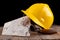 Protective helmet and tools for bricklayer. Work accessories for production workers