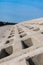 Protective seawall made of concrete blocks on the coast