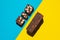 Protein date fruit candy bars fitness with nuts top view on blue yellow background with copy space and place for text