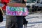 Protest against the measures of the government against Corona with a sign with the German inscription Corona dictatorship