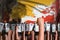 Protest in Bhutan - police special forces stand against the demonstrators crowd on flag background, revolt stopping concept,