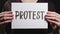 Protest sign social strike female activist message