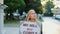 Protest walk: woman holding placard with words that people won`t comply