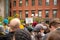 Protester marching for a peace pride rainbow flag at the Boston March for Our Lives political rally