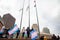 Protester marching for a peace pride rainbow flag at the Boston March for Our Lives political rally