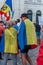 Protesters covered with the national flag