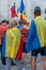 Protesters covered with the national flag