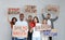 Protesters demonstrating different anti racism slogans on light background. People holding signs with phrases