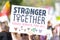 Protesters holding a sign during 3rd Womens March in Los Angeles