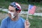 Protestor with broken surgical mask in the USA