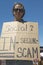 Protestor of President George W. Bush holding a sign up protesting his Social Security plan, in Tucson Arizona