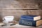 Protocols. Stack of books on wooden desk