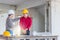 Protrait of engineer shaking hands and smiling with success agreement about construction project at construction site