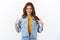 Proud and confident, motivated cute ginger girl with freckles in denim jacket, pointing herself and smiling boastful