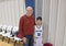 Proud grandfather with grandson after baskeball game