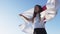 Proud Japanese girl supporter holding Flag of Japan, funny moment near the end where flags hits her in the face.