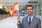 Proud man waving the Spanish flag