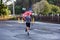 Proud member of Team RWB is running outside with an American Flag