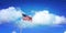 Proud to be the glory of `Old Glory`, American flag highlighted by cumulus cloud and a deep blue sky.