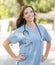 Proud Young Adult Woman Doctor or Nurse Portrait Outside