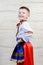 Proud young boy in a colorful costume