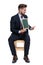 Proud young businessman presenting empty blackboard