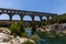 PROVENCE, FRANCE - JUNE 18, 2018: Pont du Gard (bridge across Gard) ancient Roman aqueduct across Gardon River in Provence, Franc