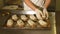 Proving dough of bran in basket. Private Bakery. Production bread.