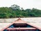 Prow of a wooden boat sailing the Amazon