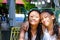 Prtrait of Cheerful Asian Little Girls in Swimsuit Smiling and Embracing Each Other Spending Time Together Outdoor