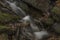 Prucelsky creek in winter cold day in Ceske Stredohori mountains