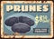 Prunes dried plums fruits rusty metal plate, food