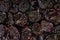Prunes texture, dry fruit closeup