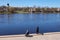 Pskov, Russia 04 may 2017. A man in a wheelchair fishing. Numerous fishermen on the Velikaya river near the Kremlin