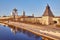 Pskov. Spring. Fishermen on river quay Great. Fortification