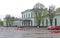 Pskov. View of railway station in rainy weather. Russian text - train station