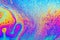 Psychedelic abstract background formed by soap bubble reflecting light