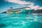 A psychedelic Cruise Ship in the Caribbean with crystal clear blue water. Generative AI