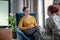 Psychoanalyst listening to woman wearing military uniform