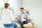 Psychologist consulting and psychological therapy session. Man in stress emotionally telling about his depression and problems to