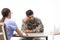 Psychotherapist working with male military officer