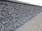Pt-Isolated wall of bricks with granite paving tiles in perspective