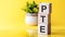 PTE - acronym from wooden blocks with letters, Pearson Tests of English PTE concept Foreign Language exams