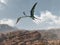 Pterosaur Quetzalcoatlus above a rocky landscape